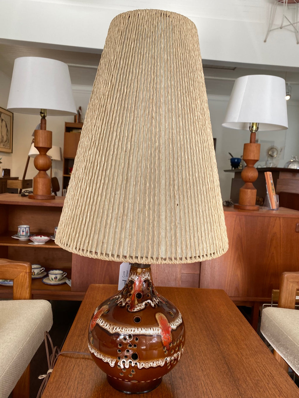 Brown and white MCM Maurice Chalvignac drip glaze table lamp with pierced lit base. Lamp can be lit three ways. Made in Canada -Cook Street Vintage