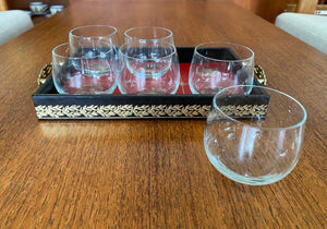 Design Phillipp tray of 6 crystal whisky 4 ounce cocktail glasses designed by Appointment to the Royal Swedish Court. Rounded bottom so nice to hold and sip from. Lovely leatherette handled tray lined in Swedish red and gold.-Cook Street VIntage