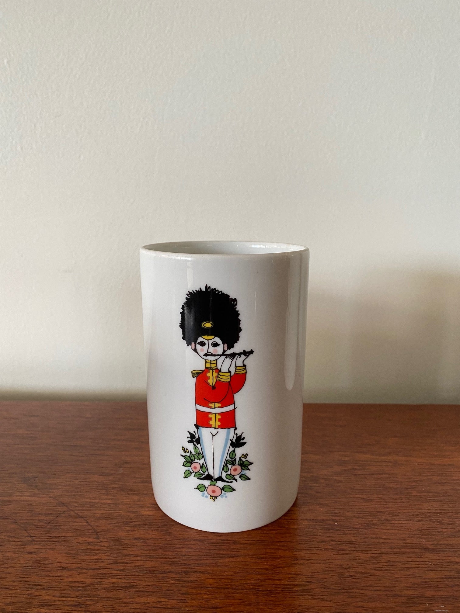 Flutist from Rare MCM Thomas Rosenthal tall ceramic pitcher with 5 matching cups. Gorgeous military Royal Guard soldier theme with musical instruments. In beautiful vintage condition. No cracks or chips-Cook Street Vintage