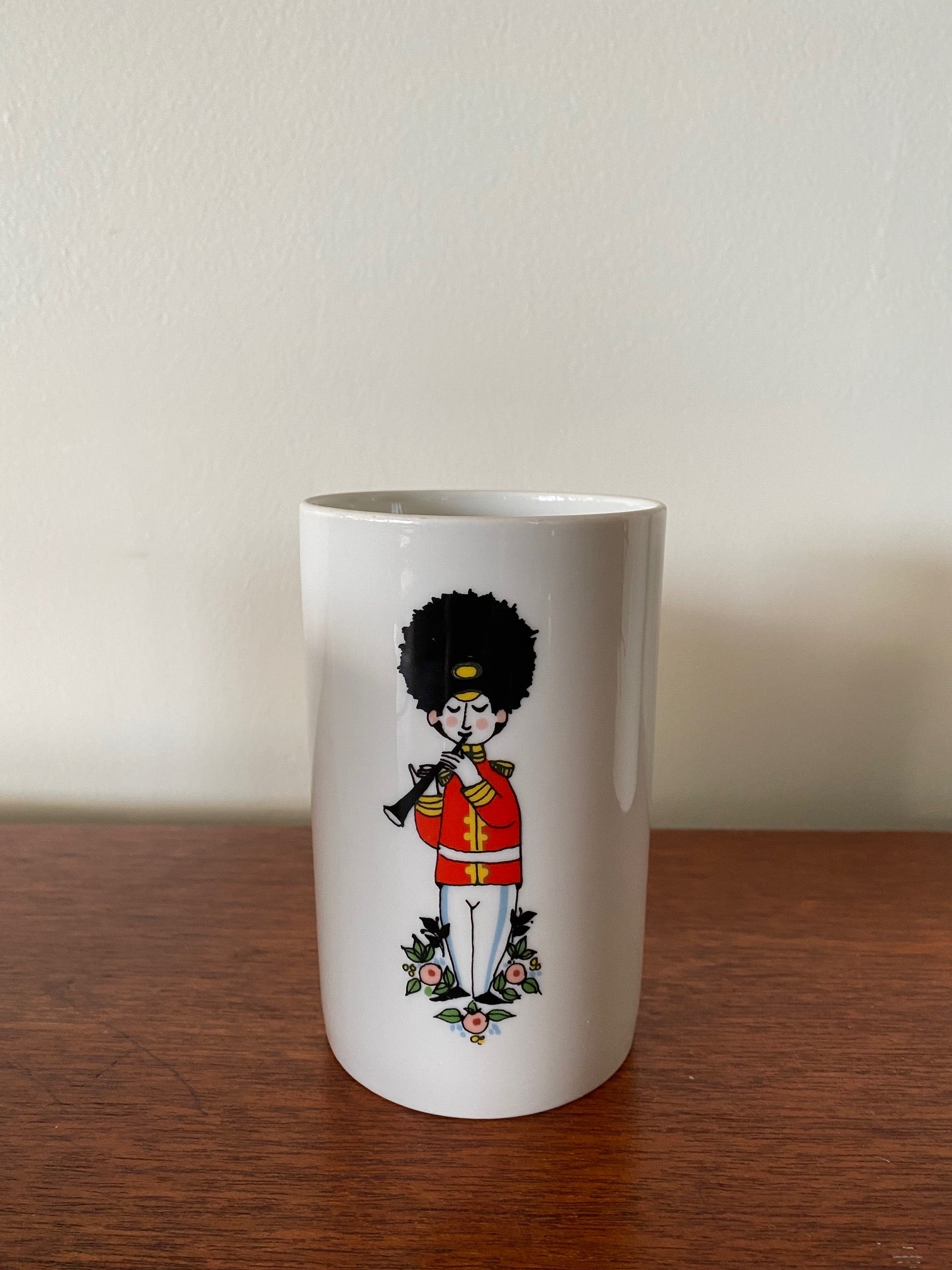 Clarinet player from Rare MCM Thomas Rosenthal tall ceramic pitcher with 5 matching cups. Gorgeous military Royal Guard soldier theme with musical instruments. In beautiful vintage condition. No cracks or chips-Cook Street Vintage
