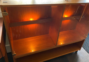 Vemb Mobelfabrik teak display cabinet with sliding glass doors and large bottom shelf- Cook Street Vintage