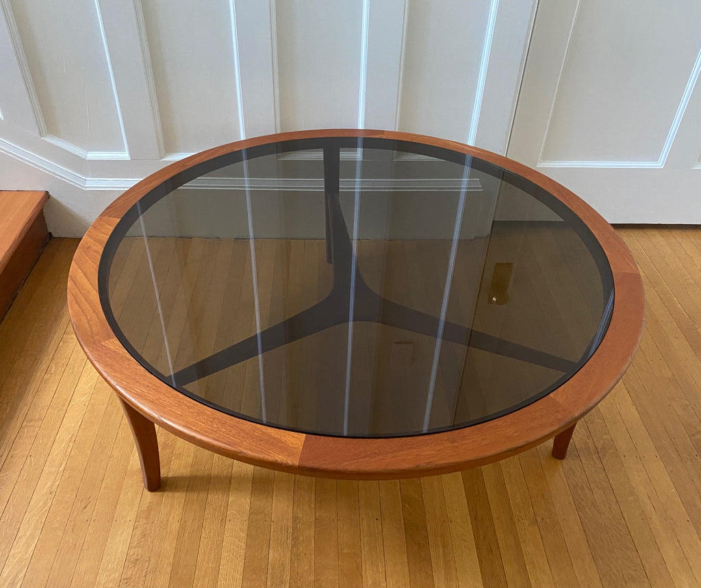 Gorgeous Mid-century Scandinavian design round coffee table. Teak with smoke glass insert- Cook Street Vintage