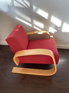 Fabulous Artek Tank chair in red upholstery. Designed by Finnish designer Alvar Aalto in 1936- Cook Street Vintage