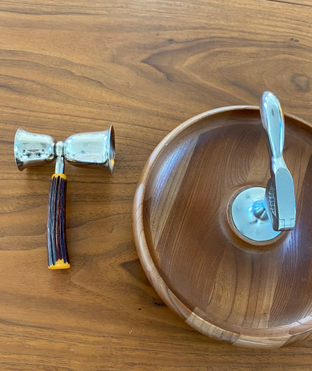 Vintage bartender's jigger with bakelite handle and nut bowl with nutcracker- Cook Street Vintage