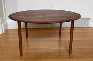 France and Son round midcentury teak coffee tablw with new candlestick legs- Cook Street Vintage