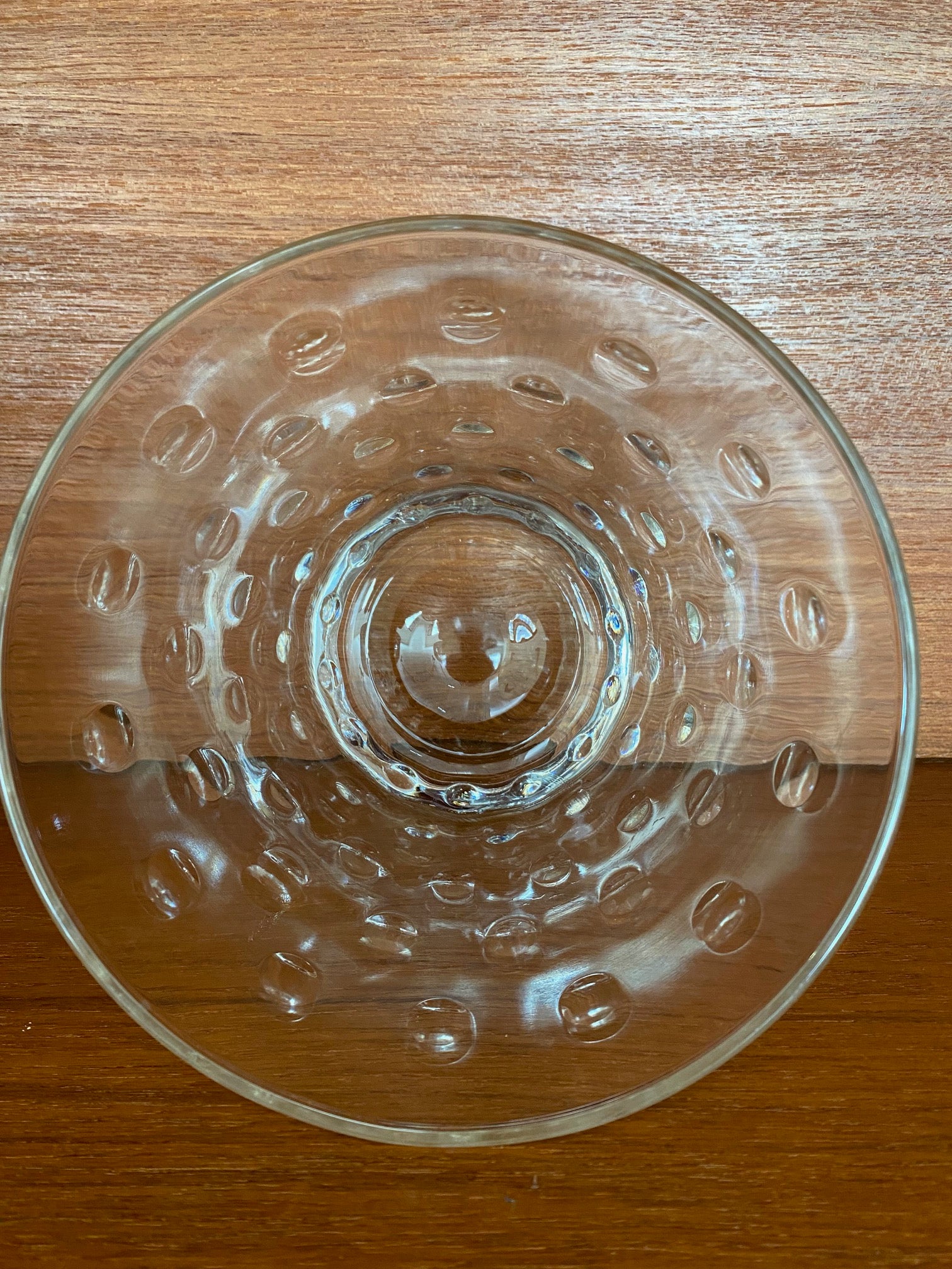 Interior of clear dimpled glass bowl- Cook Street Vintage