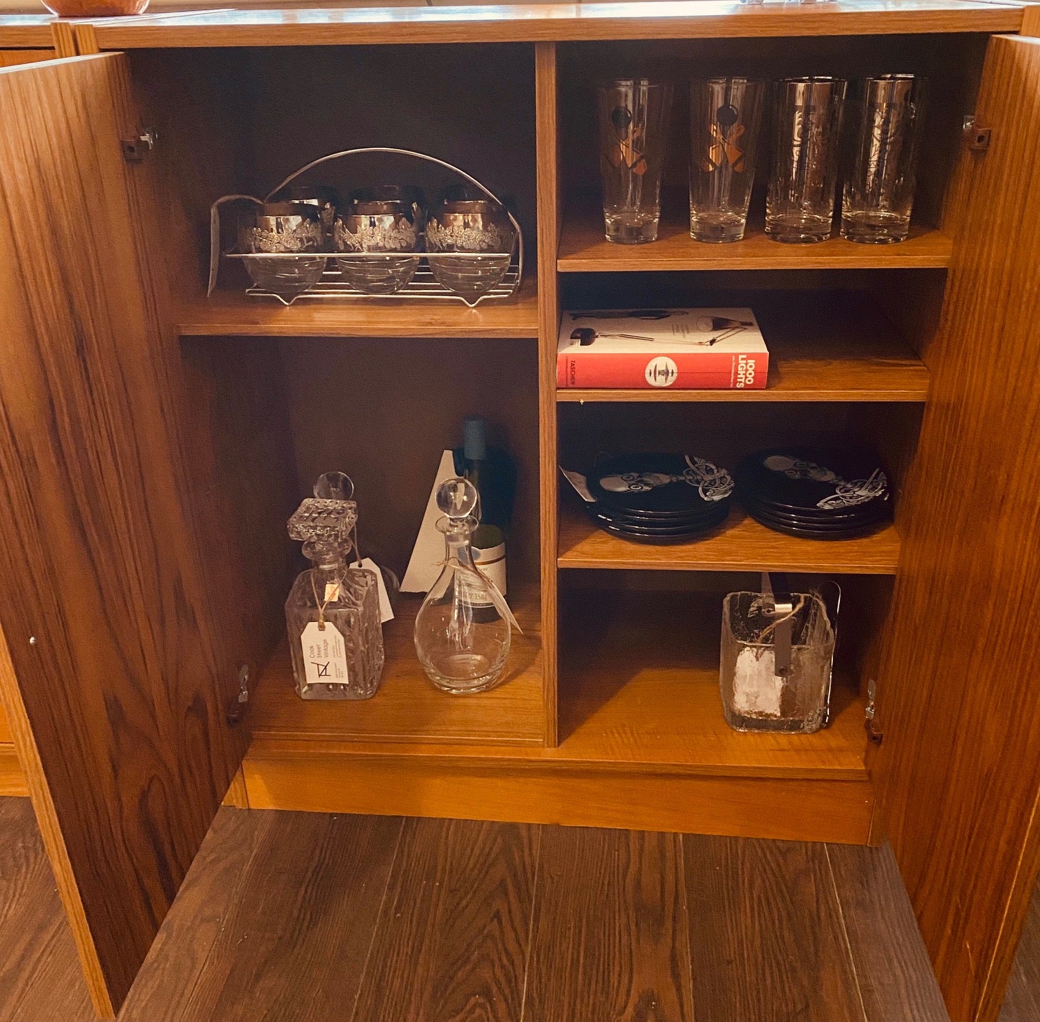 Interior of teak shelving bar cabinet- Cook Street Vintage