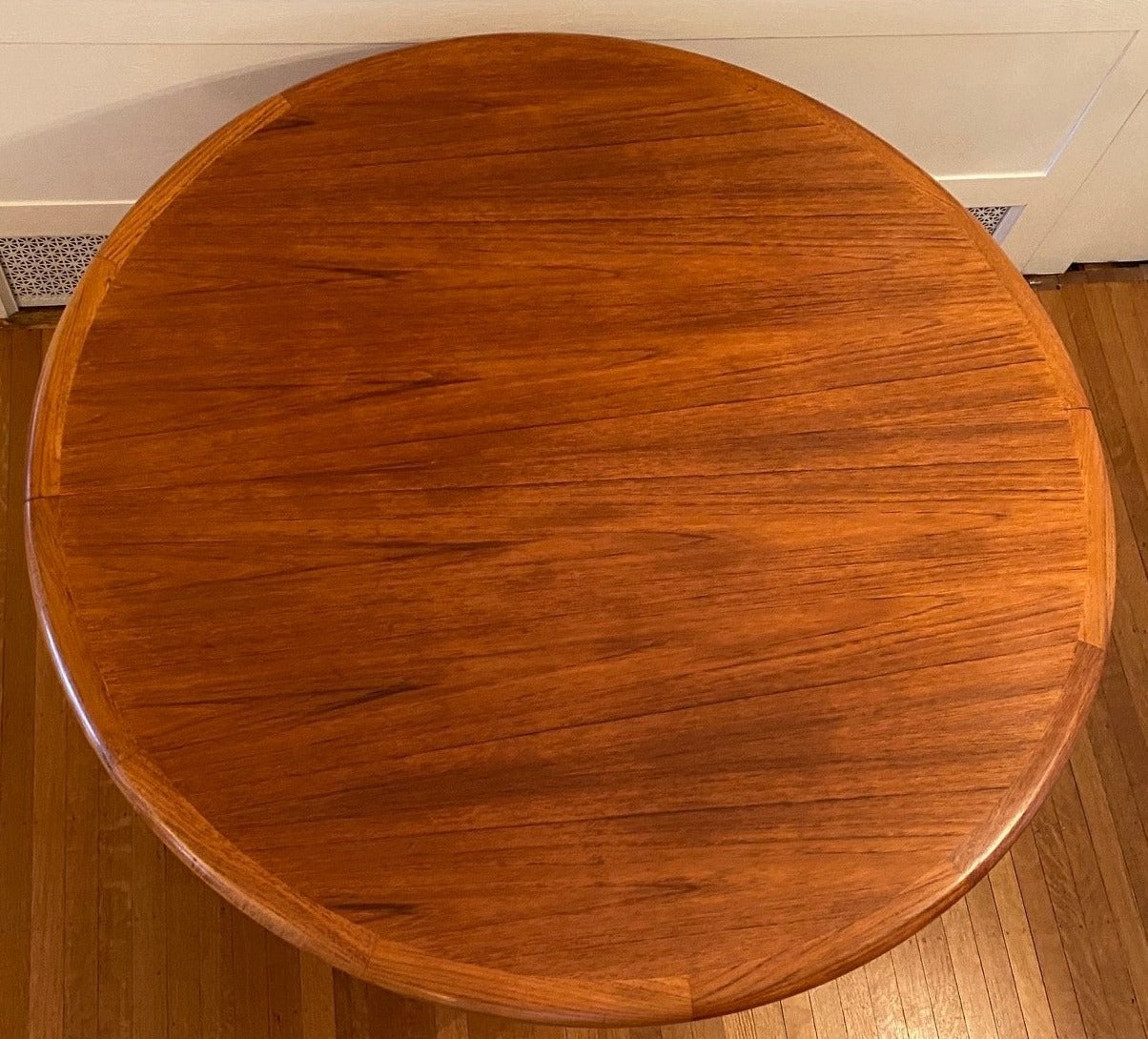 Modernist Danish teak round double pedestal table. In fabulous midcentury condition.- Cook Street Vintage
