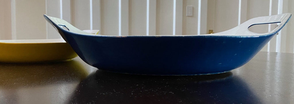 Vintage Michael Lax designed Copco bakeware in blue and white enamel.- Cook Street Vintage