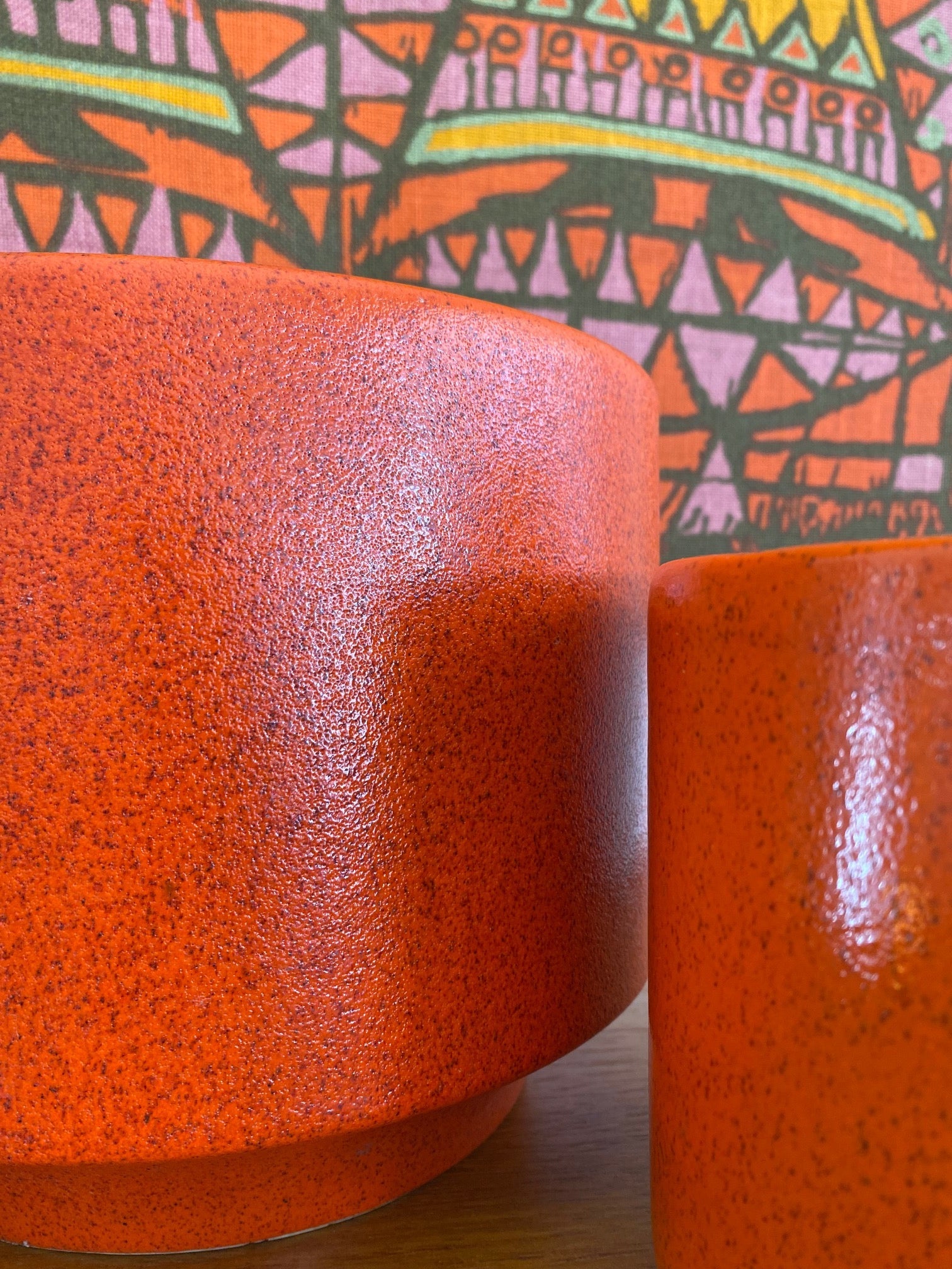 close up of orange speckled glaze of Orange Gainey Ceramics LaVerne California Planter C-10- Cook Street Vintage