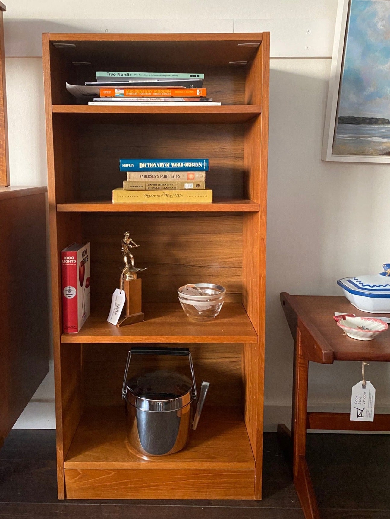 Small Teak bookcase with books and trophies on it-Cook Street Vintage