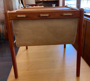 Side view of canvas sling on mid-century side table with magazine holder- Cook Street Vintage
